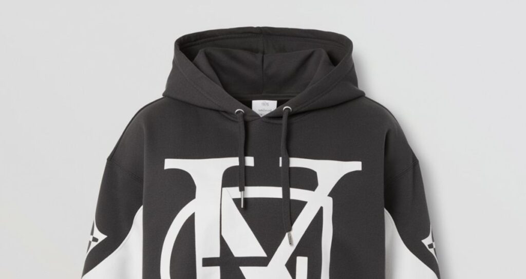 The TB Monogram Graphic Print Hoodie: A Timeless Blend of Luxury and Streetwear